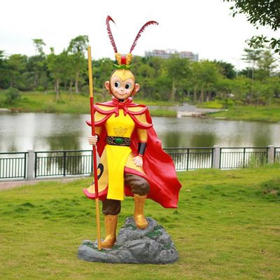 公園擺放的手拿金箍棒的玻璃鋼彩繪猴子雕塑