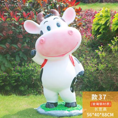 公園一只背書包的玻璃鋼牛雕塑