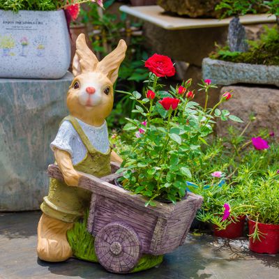 公園景區玻璃鋼彩繪推著花盆車的兔子雕塑